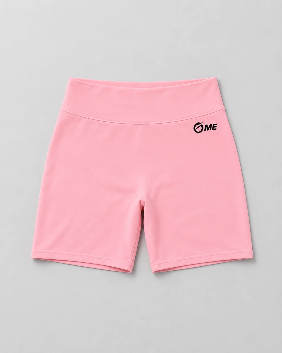 Pantalón corto ABDERA rosa claro sin modelo, vista frontal con cintura alta y logo OME negro.